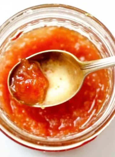 Homemade quince jam recipe showing golden quinces being grated and transformed into ruby red jam in glass jars