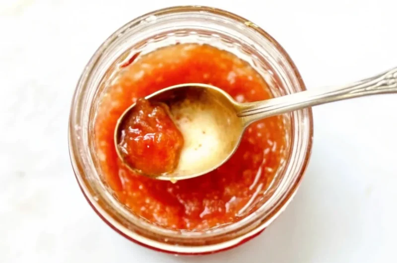 Homemade quince jam recipe showing golden quinces being grated and transformed into ruby red jam in glass jars
